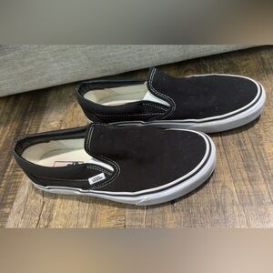 Vans Women’s Black and White Slip-On Sneakers
